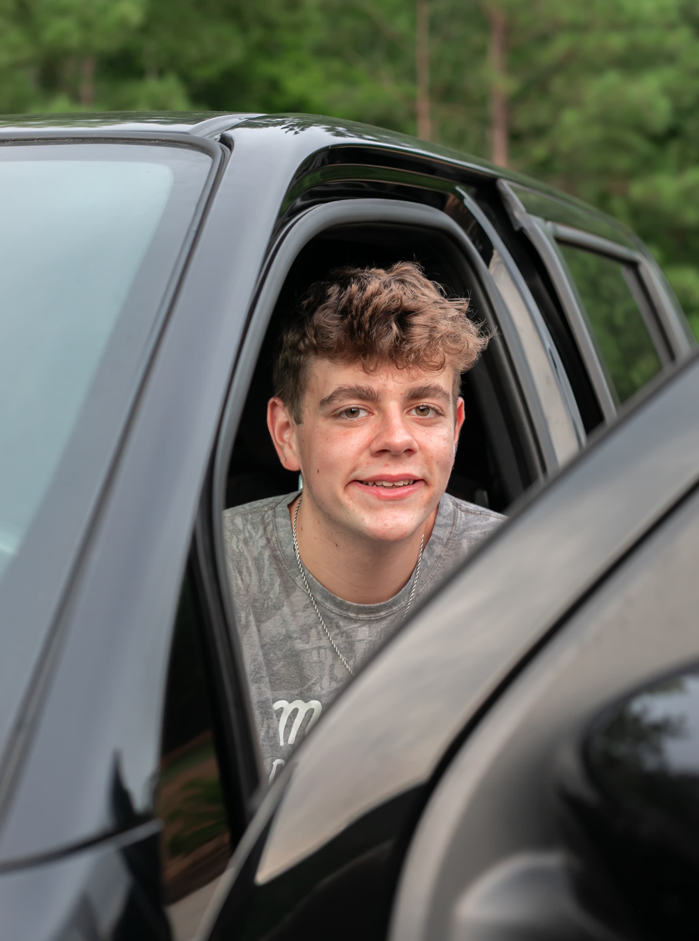 High school senior portrait through the truck window